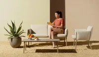 Sillón de acero individual con cojines desenfundables